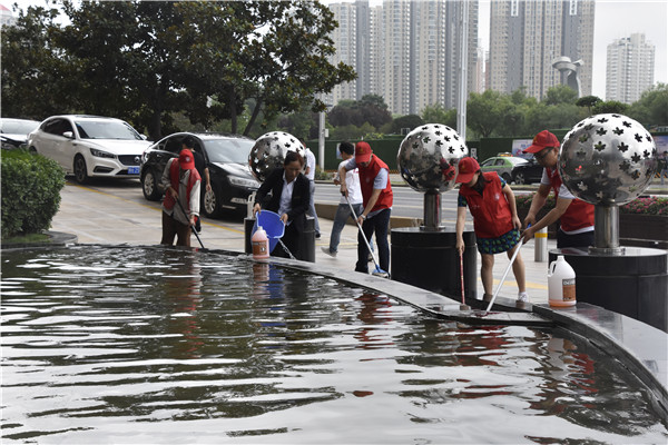 华体会平台-华体会（中国）一站式服务平台
联合商务区社区开展“清洁家园 美化社区”       主题志愿服务活动